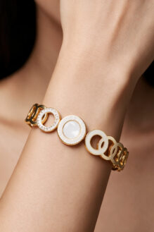 Roman Radiance Circular Motif Bangle Bracelet